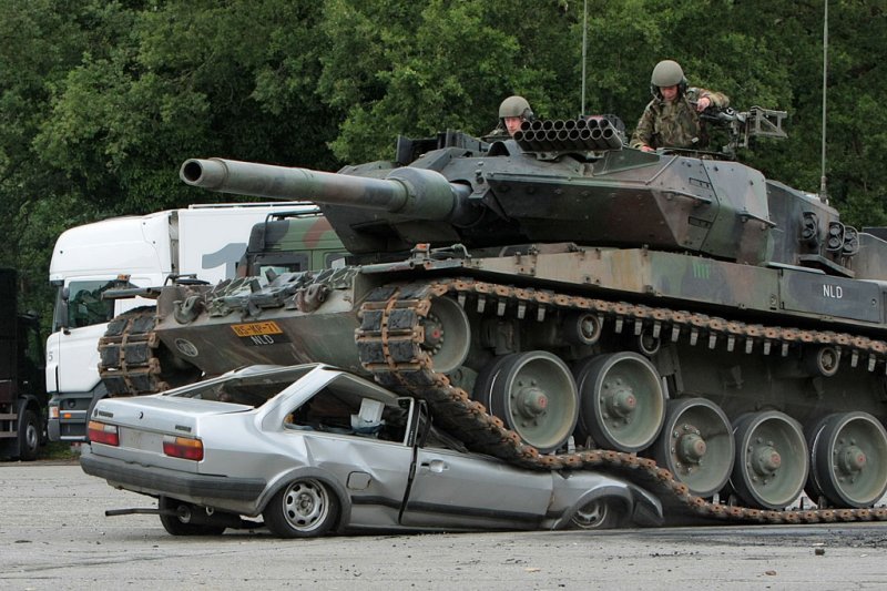 cool photos, tank photos, tank vs car, tank crushes car, germany, amry, military