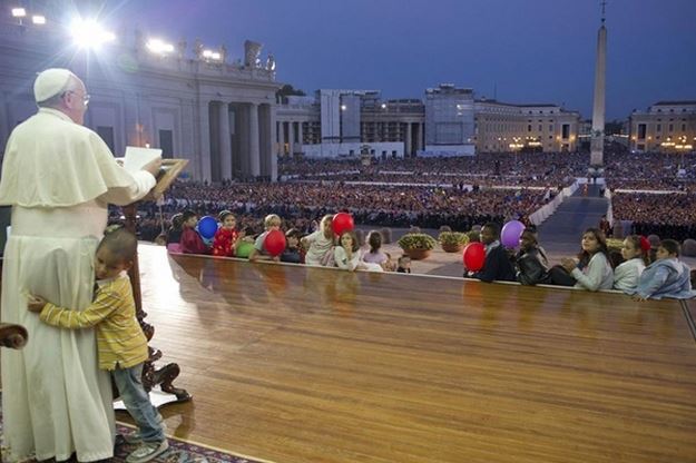 Pope francis refused to send away a child who had run on stage to hug him