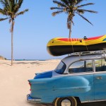 old-car-with-the-boat-on-hawaiian-beach