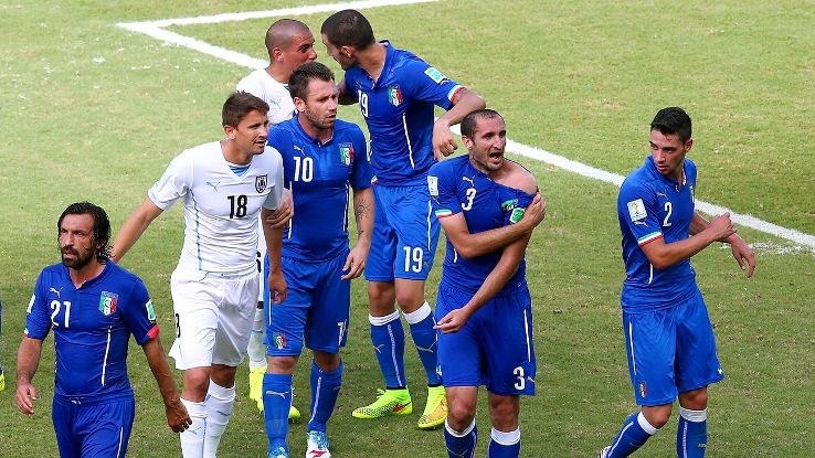 Italy beaten by uruguay,uruguay beat italy,fifa2014,fifa world cup,luis suarez,chiellini,suarez bites chiellini,uruguay progress to pre-quaterfinals,suarez ban,disgraceful suarez