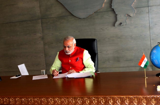 narendra modi,workaholic,game changer, netas,babus, business standards,PM, Acche din aane wale hain,Kiren Rijiju
