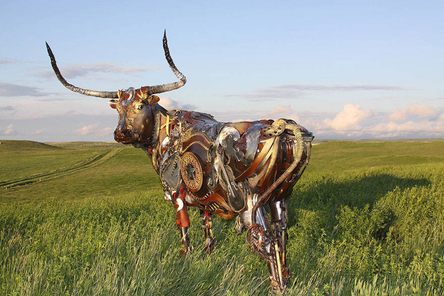 Scrap metal sculptor, bronze sculptor by john lopez, john lopez, metal recycle idea, lemmon, scrap metal sculptor in south dakota, western style sculptures, sculptures using old farm equipment