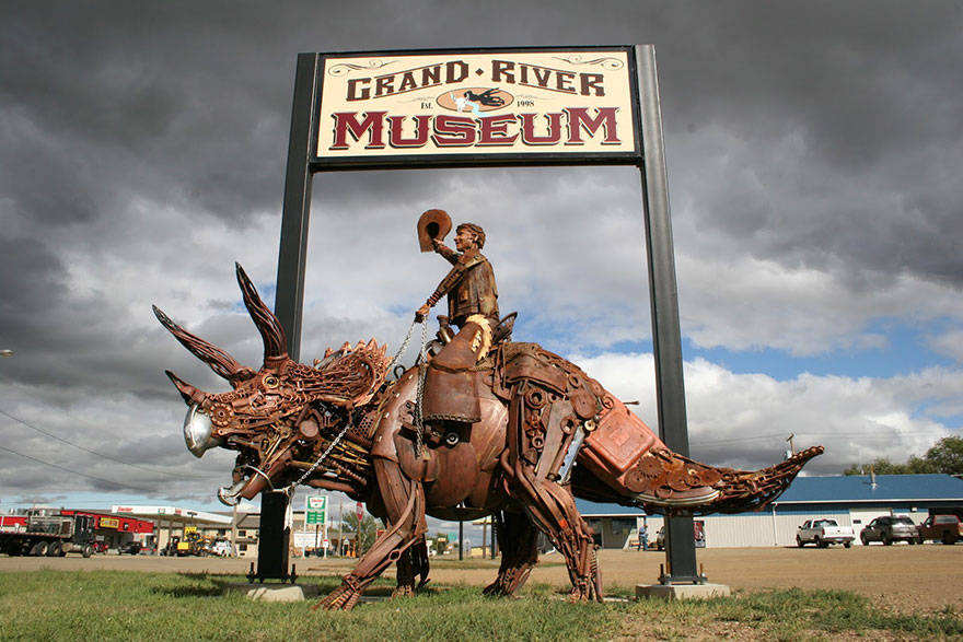 Scrap metal sculptor, bronze sculptor by john lopez, john lopez, metal recycle idea, lemmon, scrap metal sculptor in south dakota, western style sculptures, sculptures using old farm equipment