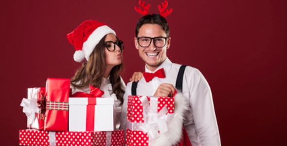 Loving couple with a lot of christmas gifts