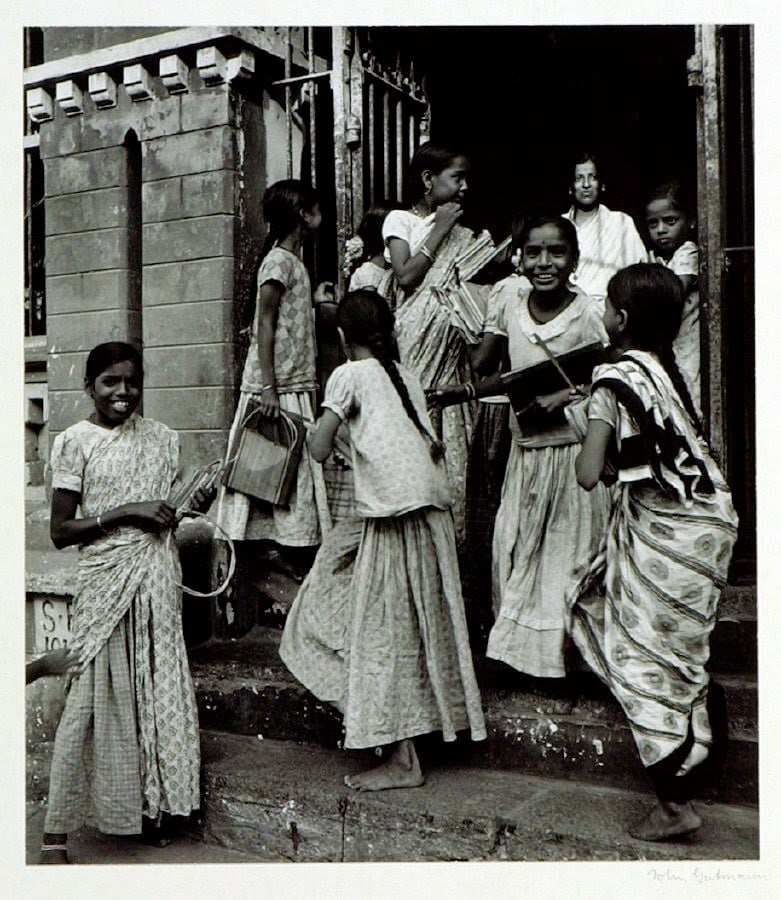 Girl students and teacher leaving their school in bangalore - c. 1944-45