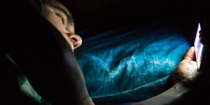 man sleeping with phone, how people sleep