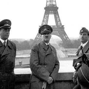 Hitler in front of eiffel tower