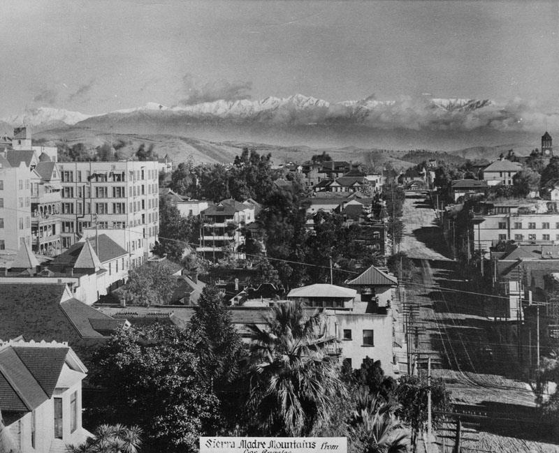 View of the San Gabriel snow capped mountains from the 200 block of South Olive St on Bunker Hill c.1905