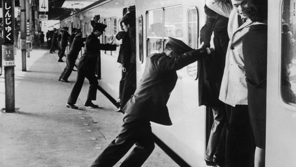 Japan, japanese train, japanese train pusher, pusher, asia, oshiya, weird, wtf, omg, railway system, tokyo, train pushers tokyo, railway station attendant