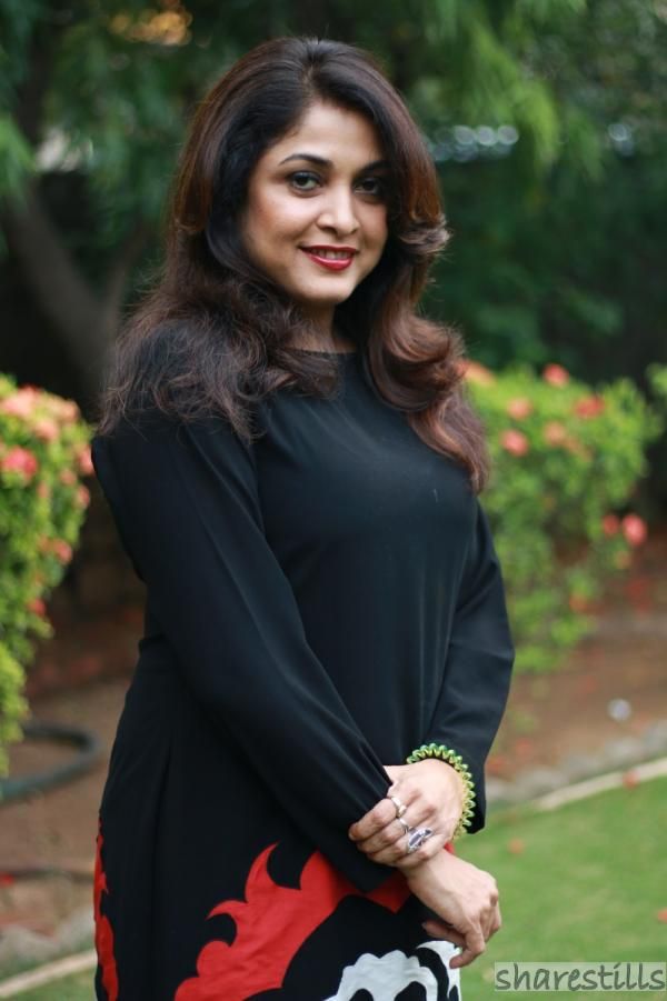 Ramya krishnan pic in black top