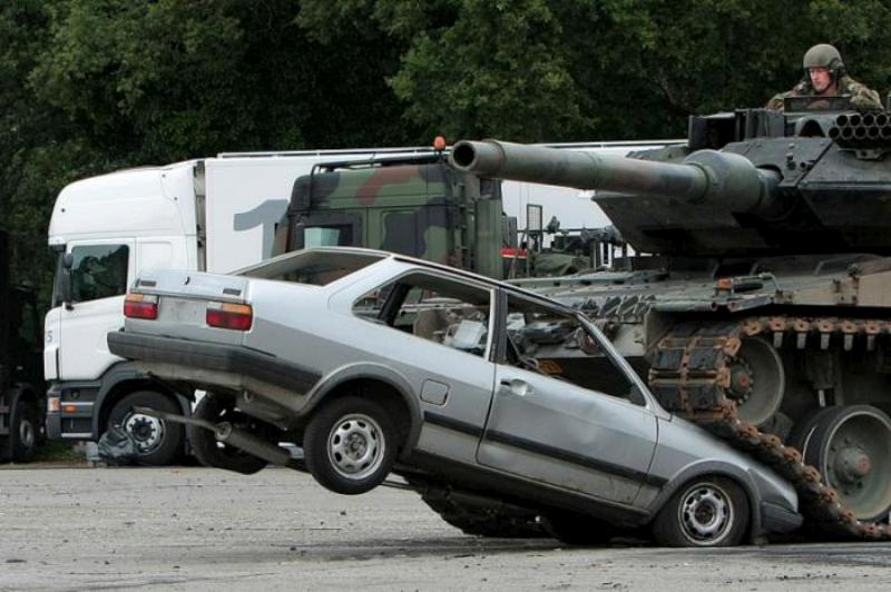cool photos, tank photos, tank vs car, tank crushes car, germany, amry, military