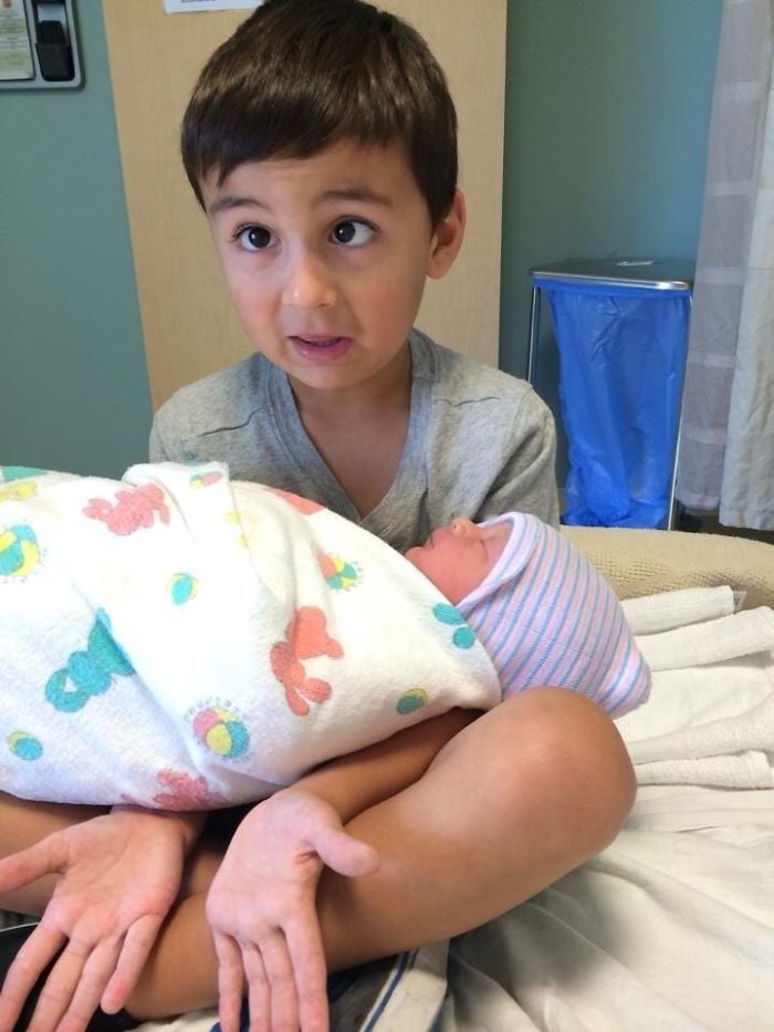 kids, funny, lol, sibling, sibling rivalry, babysitting, family, kids reactions, hold a baby, hilarious, awkward family photos, funny photos