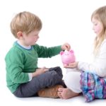 kids-saving-in-piggy-bank-teaching-children-about-money