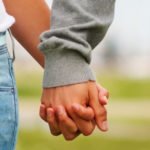 womn hand in hand