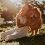 cute child with exotic animal