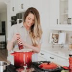 women cooking pasta in pasta pot