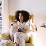 dog and lady with book