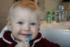 kid brushing teeth
