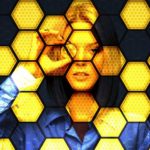 lady behind honeycomb with bitcoin