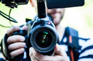 man with dslr camera