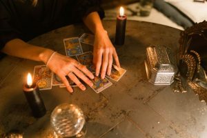 women reading tarot card