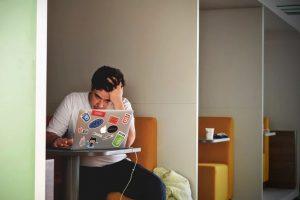 men wearing white tshirt coding