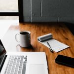 essay writing mac book and coffee mug