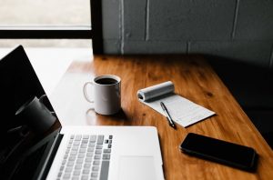 essay writing mac book and coffee mug