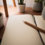 blank notebook and pen
