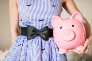 lady holding piggy bank