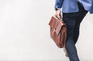 man with leather briefcase bag