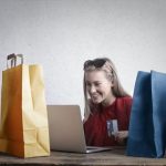 happy girl doing online shopping