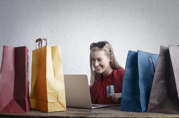 happy girl doing online shopping