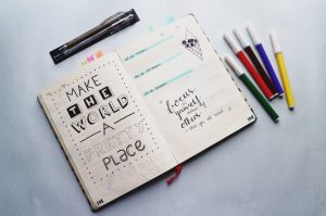 diary and sketch pens for notes