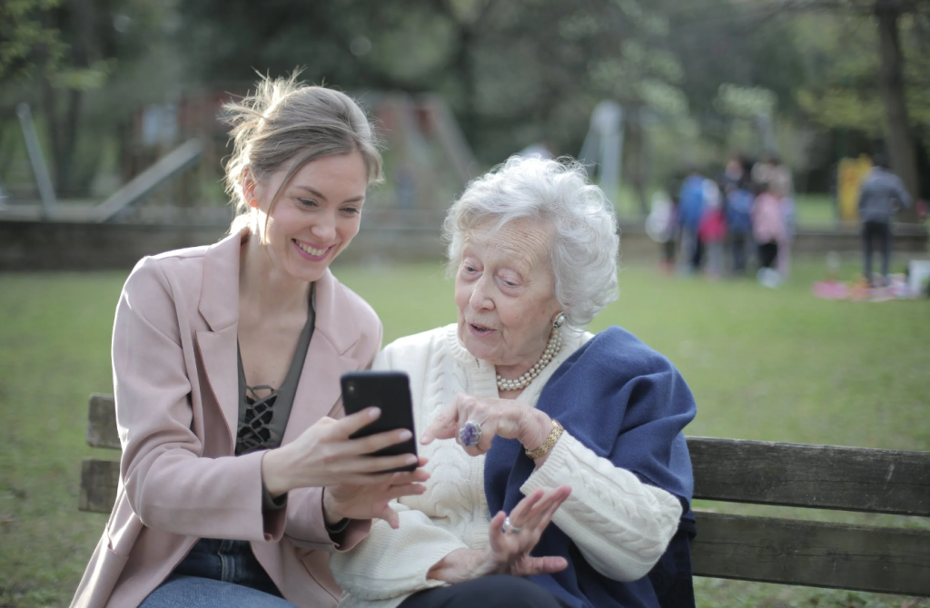 grand mother and grand daughter playing online gaming