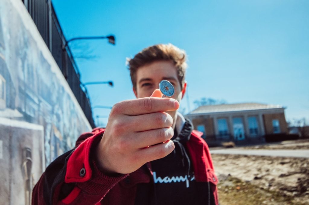 Man tossing a coin