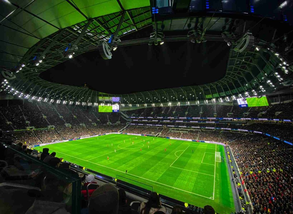 People sitting on stadium seats