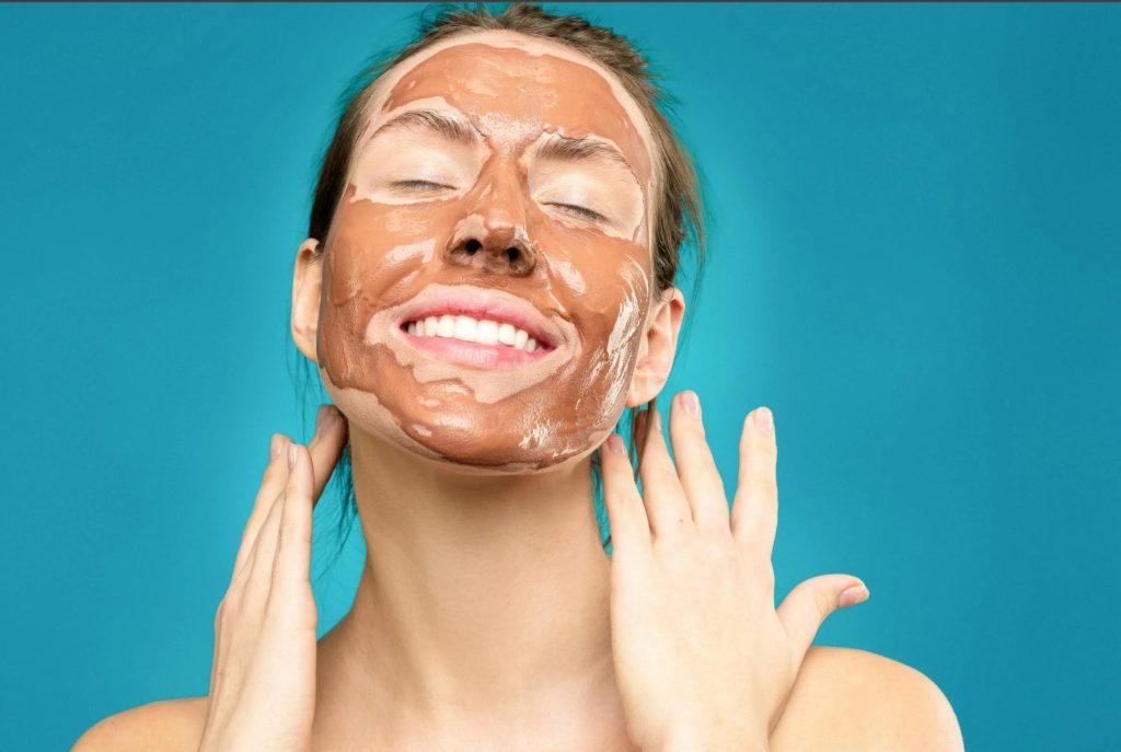 happy girls with chocolate on her face