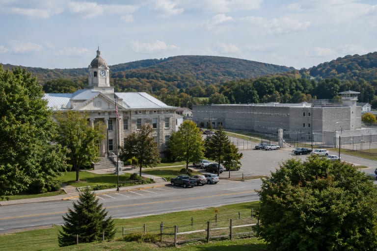 Wayne County courthouse and correctional facility complex surrounded by rolling hills in Pennsylvania.